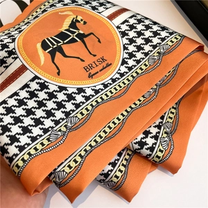 Orange houndstooth silk scarf with horse motif and chain patterns for women