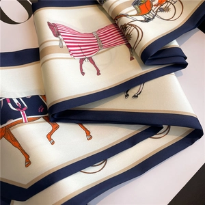 Elegant ivory silk scarf with navy borders and equestrian horse patterns for women