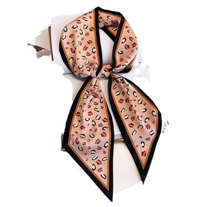 Pink leopard print skinny silk scarf with geometric border and elegant bow knot styling