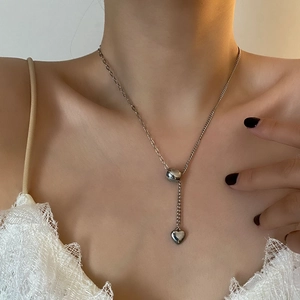 Silver-toned heart pendant Y-necklace with adjustable slider bead on a dainty chain