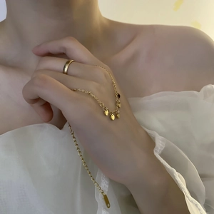 Elegantes Set aus goldener Titanstahl-Fußkette und minimalistischem Ring für Damen