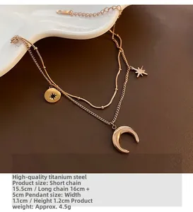 Détails du bracelet étagé en acier titane or rose avec pendentifs étoile et lune