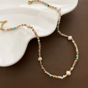 Luxury baroque pearl necklace with earth-tone stone beads and turquoise gold accents