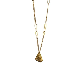 Gold vintage titanium necklace with portrait relief pendant and asymmetric cuban chain