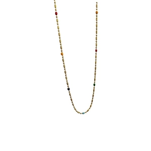 Minimalist bohemian gold beaded necklace with colorful round charms on white background