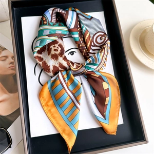 70x70cm faux silk headscarf featuring vibrant orange and blue geometric leopard prints