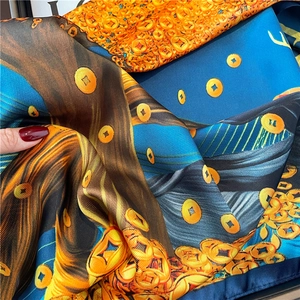 Glossy silk scarf with money tree patterns and blue orange contrast silk fabric texture