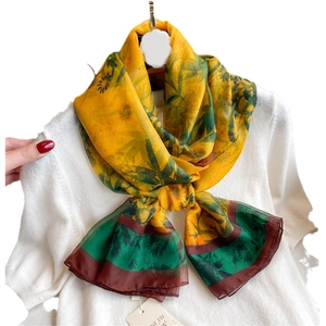 Elegant oversized floral chiffon scarf in ginger yellow with botanical patterns for women