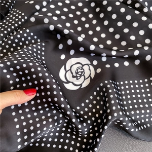 Elegant polka dot silk square scarf featuring a white camellia flower design for women
