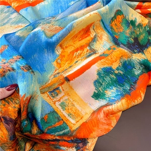Foulard en soie avec motif de peinture impressionniste aux tons orange et bleu éclatants