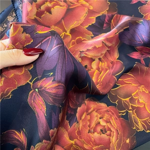 Navy blue 70cm twill silk scarf featuring elegant red peony floral patterns and texture