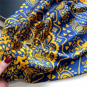 Blue and yellow paisley silk scarf for women featuring premium satin floral print