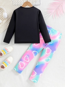 Tenue bébé fille avec haut noir à manches longues et legging dégradé à motifs cœurs