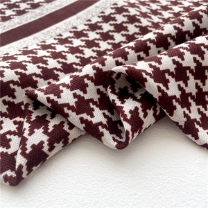 Classic houndstooth scarf in burgundy and beige with textured knit finish