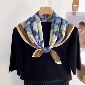 Elegant floral square neck scarf in blue and brown silk texture on black top