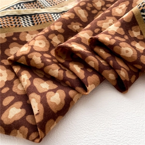 Leopard print square scarf with houndstooth borders and yellow stripes for women