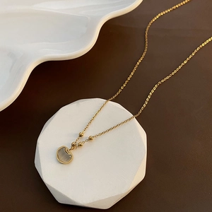 Collier En Acier Titane Plaqué Or Avec Pendentif Serrure De Paix En Pierre Oeil De Chat Chaîne De Clavicule Ruyi