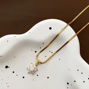 Exquisite gold snake chain necklace with white enamel soccer ball pendant for women