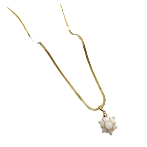 Exquisite gold snake chain necklace with a white turtle pendant in minimalist design