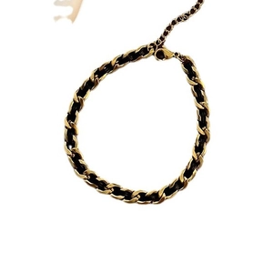 Handwoven black leather and gold titanium steel bracelet with adjustable lobster clasp