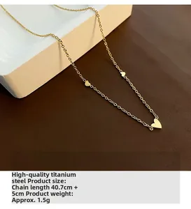 Détails d'un collier cœur doré en acier titane de qualité supérieure avec dimensions