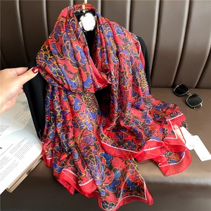 Floral faux silk large scarf featuring red vintage patterns and premium draped texture
