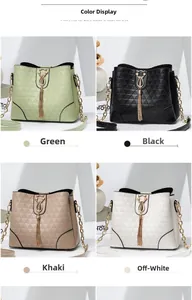 Selection of bucket bags in green, black, khaki, and off-white with cat tassel charms