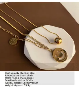 Detail view of double-layered titanium steel smile pendant necklace with size measurements