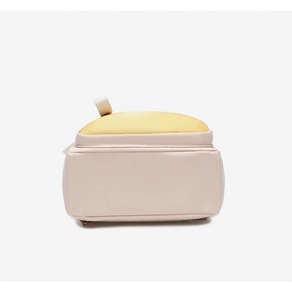 Detail view of the water-resistant nylon base and contrasting stitching on the backpack