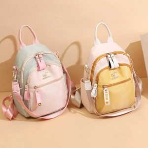 Minimalist macaron color-block waterproof backpack for women with multi-way straps