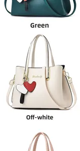 Close-up of Danbaoly tote bags with litchi grain leather texture and heart charms