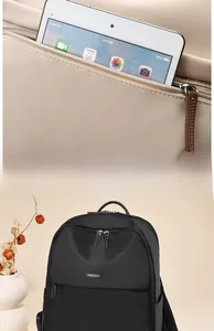 Detail of spacious interior compartment showing laptop and tablet storage capacity