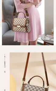 Detail of checkered crossbody bag with brown leather trim and wide jacquard strap