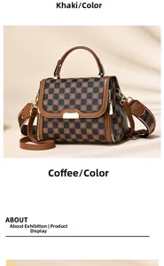 Detail of vintage checkerboard handbag with floral motifs and brown leather trim