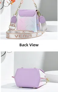 Detail view of mini lavender crossbody bag with floral texture and gold bottom studs