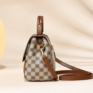 Classic checkered brown crossbody bag with leather handles and gold metal hardware detail