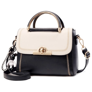 Chic color-block square handbag with gold ring handles and cute bear pendant charm