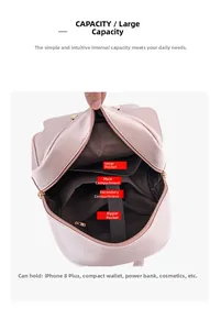 Pink faux leather backpack interior with functional compartments and brown lining