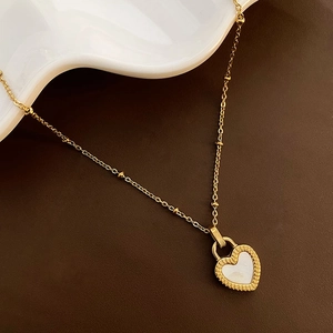 Double-sided white shell heart pendant necklace with gold plated satellite chain
