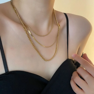 Three-layer gold stainless steel necklace set with rope, snake, and Cuban curb chains