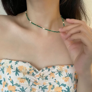 Modern vintage necklace with natural malachite green beads and freshwater pearls