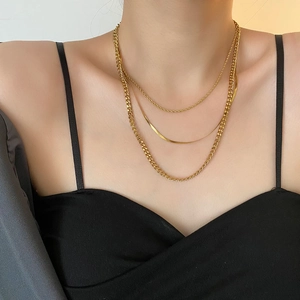 Three-layer layered gold stainless steel necklace set with snake, rope, and cuban link chains