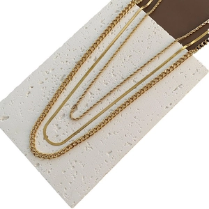 Three-layer gold stainless steel necklace set with cuban, snake, and twisted chain