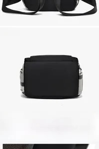 Detail of black oxford backpack showing side plaid pockets and durable nylon straps