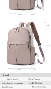 Detail showing two sizes of the pink Oxford fabric backpack with specific dimensions