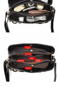 Detailed internal view showing multi-compartment lining of black glossy handbag