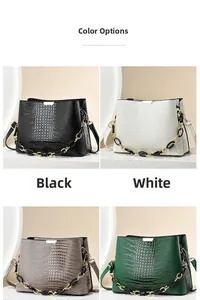 Detailed grid view of crocodile embossed bucket bags in black, white, gray, and green colors