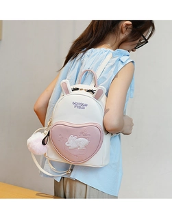 Mini bunny backpack for girls featuring 3D rabbit ears and cute heart front pocket