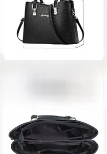 Detail view of black crocodile pattern handbag with dimensions and internal compartments