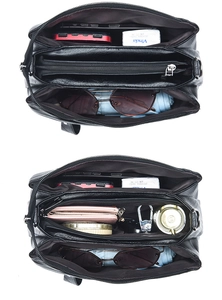 Close-up of black textured leather bag featuring three large zipper compartments for storage